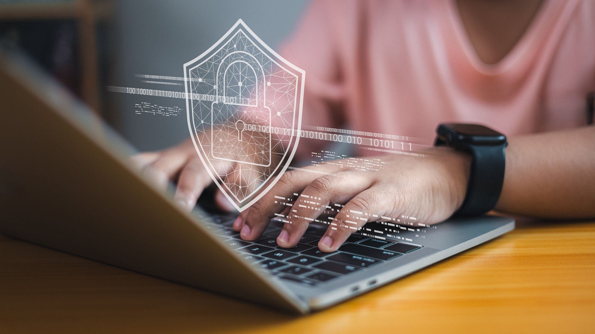 Cybersecurity concept, child using laptop with digital lock shield icon, online data protection and internet safety